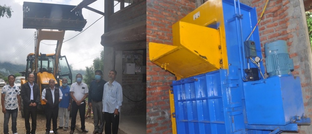 Deputy Commissioner, Wokha Orenthung Lotha with others during the inauguration of Bailing Machine Unit and commissioning of the new JCB at Wokha on October 21. (DIPR Photo)